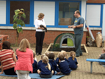 Image of Omlet Delivery Driver talking to schoolchildren
