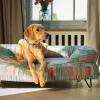 A retriever resting on top of the pawsteps electric bolster dog bed
