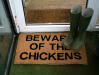Beware of the chickens doormat with wellies on top