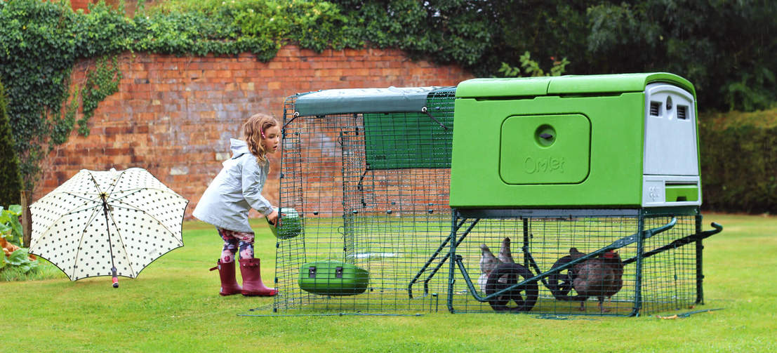 The Eglu Cube’s stable style run doors make it easy to replenish your chicken’s feed and water.