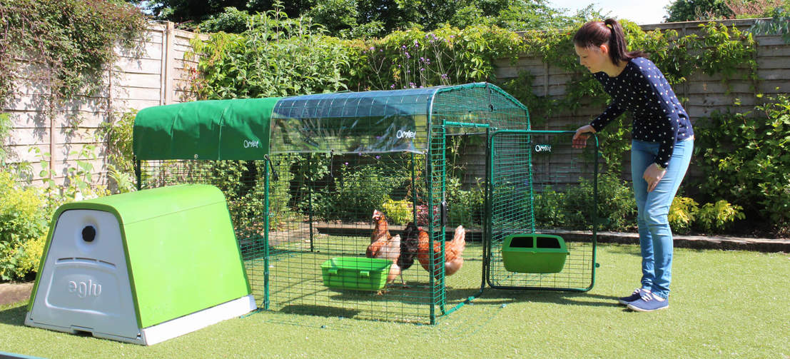 A woman opening a lo rise walk in run with a cover over the top with a Go connected