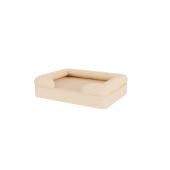 A beige dog bed.