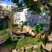 Green Eglu Cube large chicken coop and run in garden