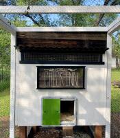 A wonderful unique chicken coop with Autodoor attached.