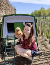 Posing for the photo, every day is a pleasure to take care of my chickens. happy with my hobby! 