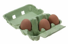 Green egg box with three eggs