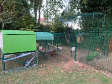 Omlet green Eglu Cube large chicken coop and run connected to walk in chicken run
