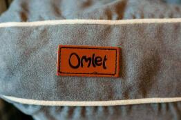 Omlet tag sewed in the Fido Studio dog bed