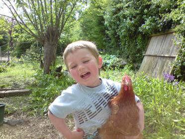 Vaughan & nuzzle one of our 7 hens