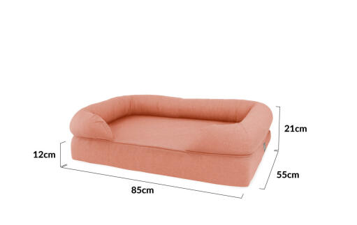 The dimensions of a medium 36 pink bolster bed
