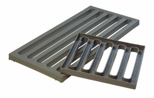 Plastic roosting bars for an Eglu chicken coop make cleaning easy