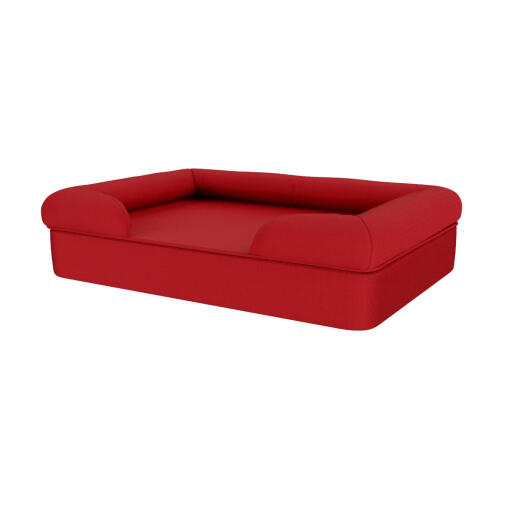 A red memory foam dog bed.