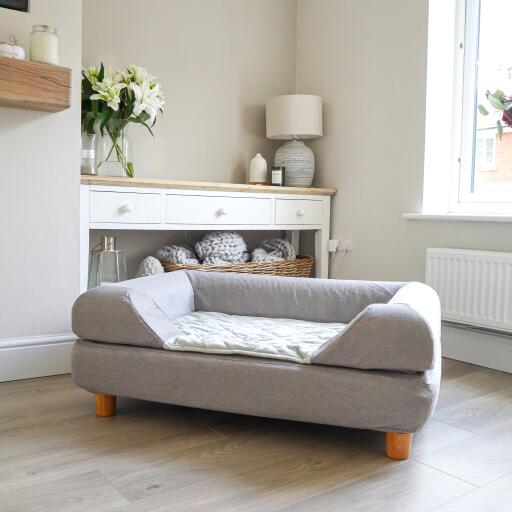 Topology dog bed with bolster topper